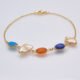 Mixed bezel-set Gemstone and Freshwater Pearl Bracelet, shown on plain white surface