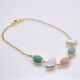 Mixed Bezel-set Pastel Gemstone and Freshwater Pearl Bracelet Mixed Bezel-set Pastel Gemstone and Freshwater Pearl Bracelet, image shows bracelet viewed from the side, on plain white background
