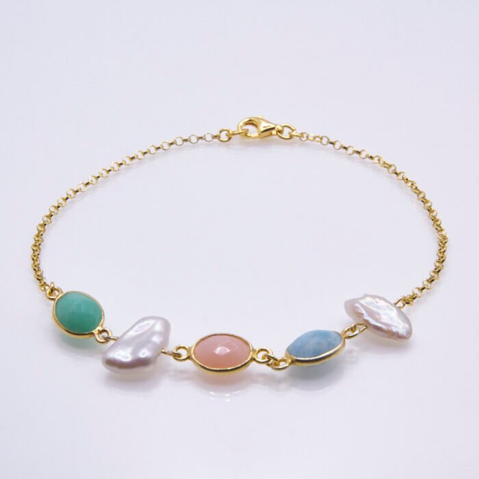 Mixed Bezel-set Pastel Gemstone and Freshwater Pearl Bracelet Mixed Bezel-set Pastel Gemstone and Freshwater Pearl Bracelet, image shows bracelet viewed from the front, on plain white background
