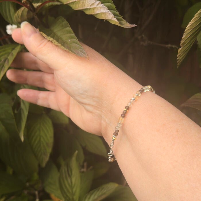 Leaf Charm Mixed Gemstone Bracelet, image shows bracelet worn on model's wrist