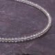 Lemon Quartz Sterling Silver Bracelet, image shows close-up of part of gemstone strand on dark slate background
