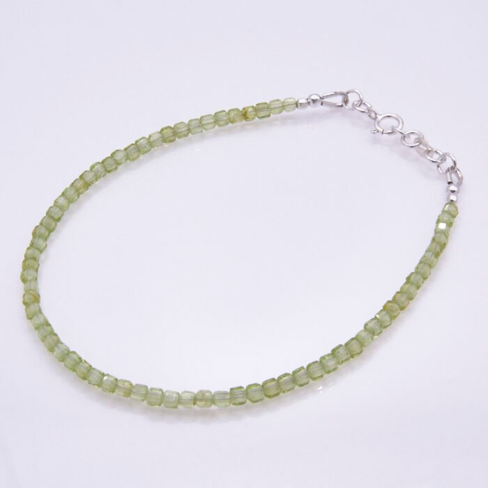 Peridot and Sterling Silver Bracelet, shown on plain white background