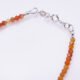 Carnelian and Sterling Silver Bracelet, image shows close-up of clasp and part of gemstone strand on plain white background