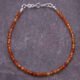 Carnelian and Sterling Silver Bracelet, shown from above on dark slate background