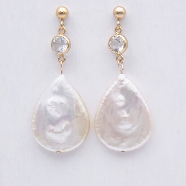 White Topaz and Freshwater Pear Pearl Earrings, shown hanging on display card