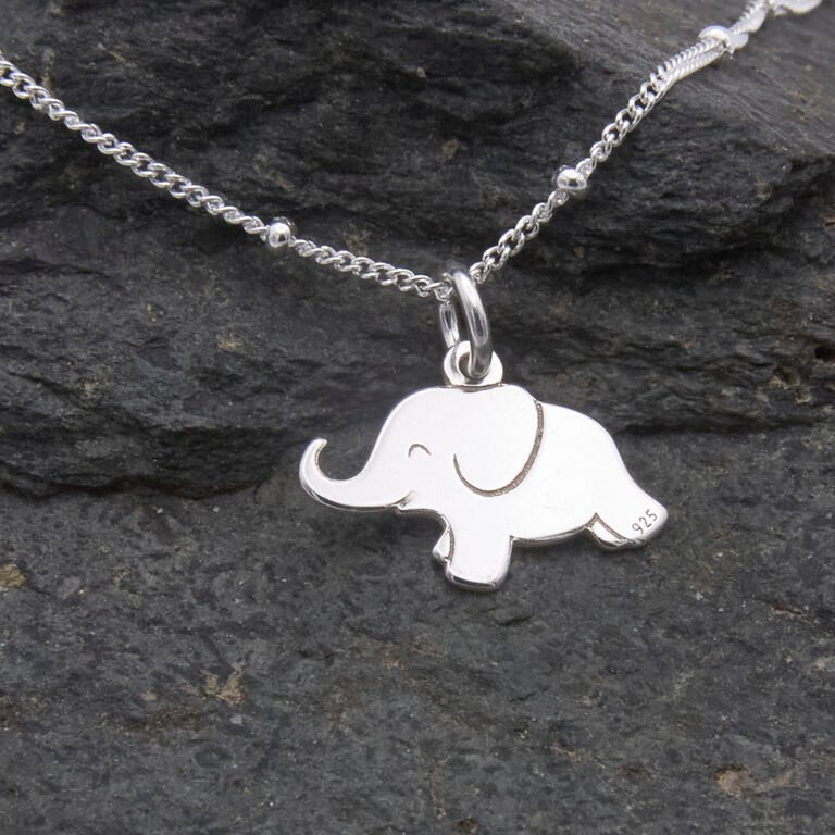 Sterling Silver Elephant Charm on Satellite Chain, image shows close-up of elephant on dark stone background