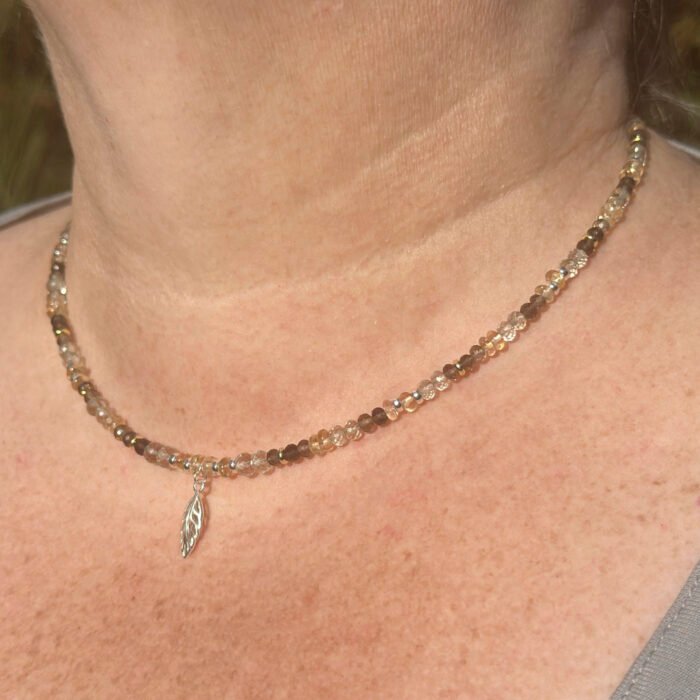 Leaf Charm Mixed Gemstone Necklace, image shows necklace worn by model