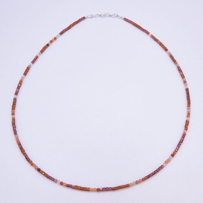 Garnet and Carnelian Gemstone Necklace, shown from above on plain white background