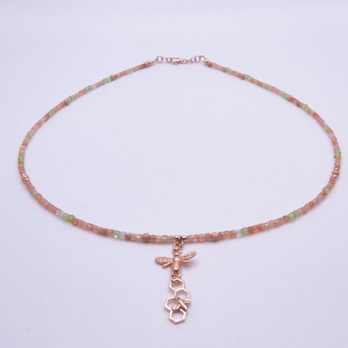 Rose Gold Gemstone and Bees Necklace, shown on plain white background